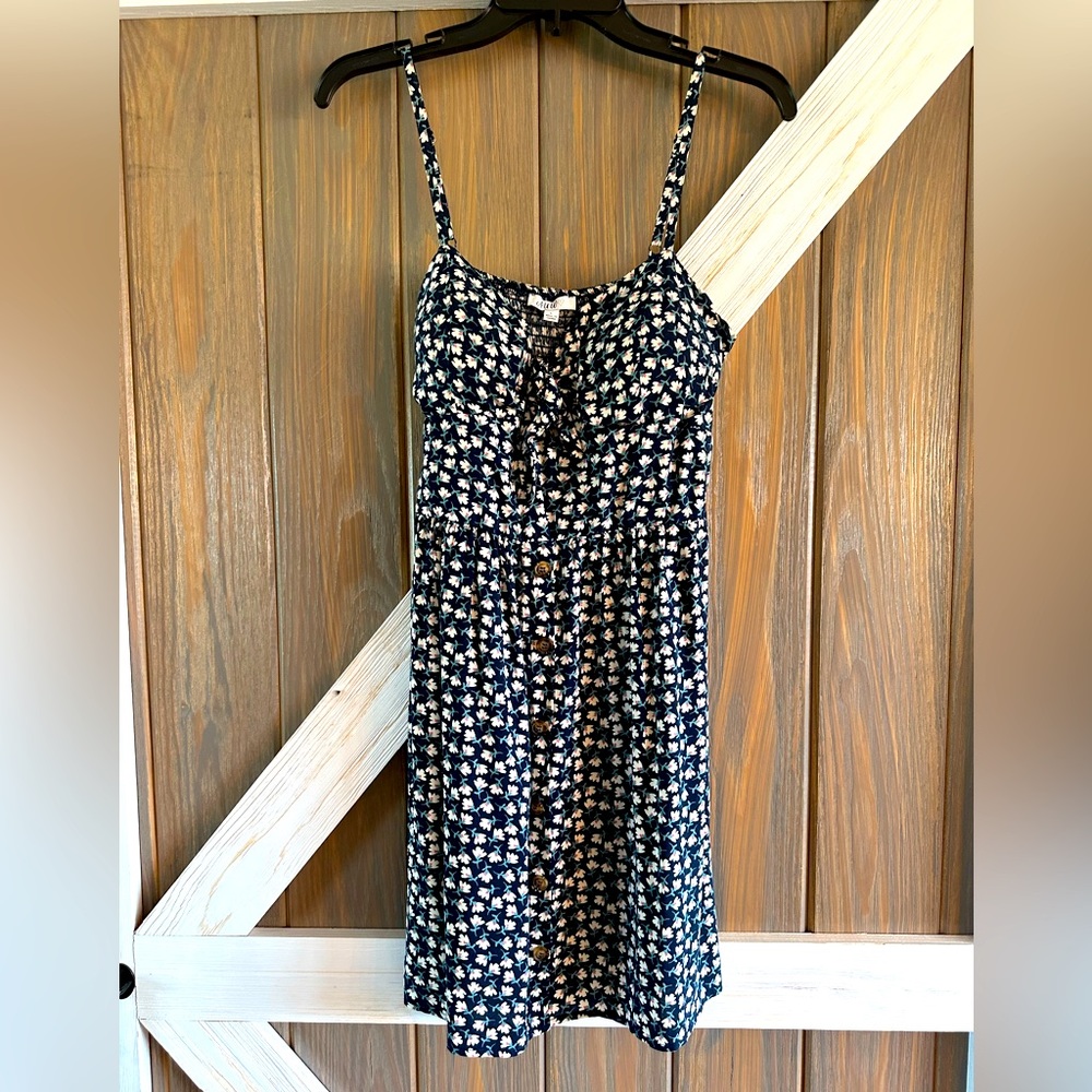 2 Adorable Dresses! Size large in juniors! Never been worn